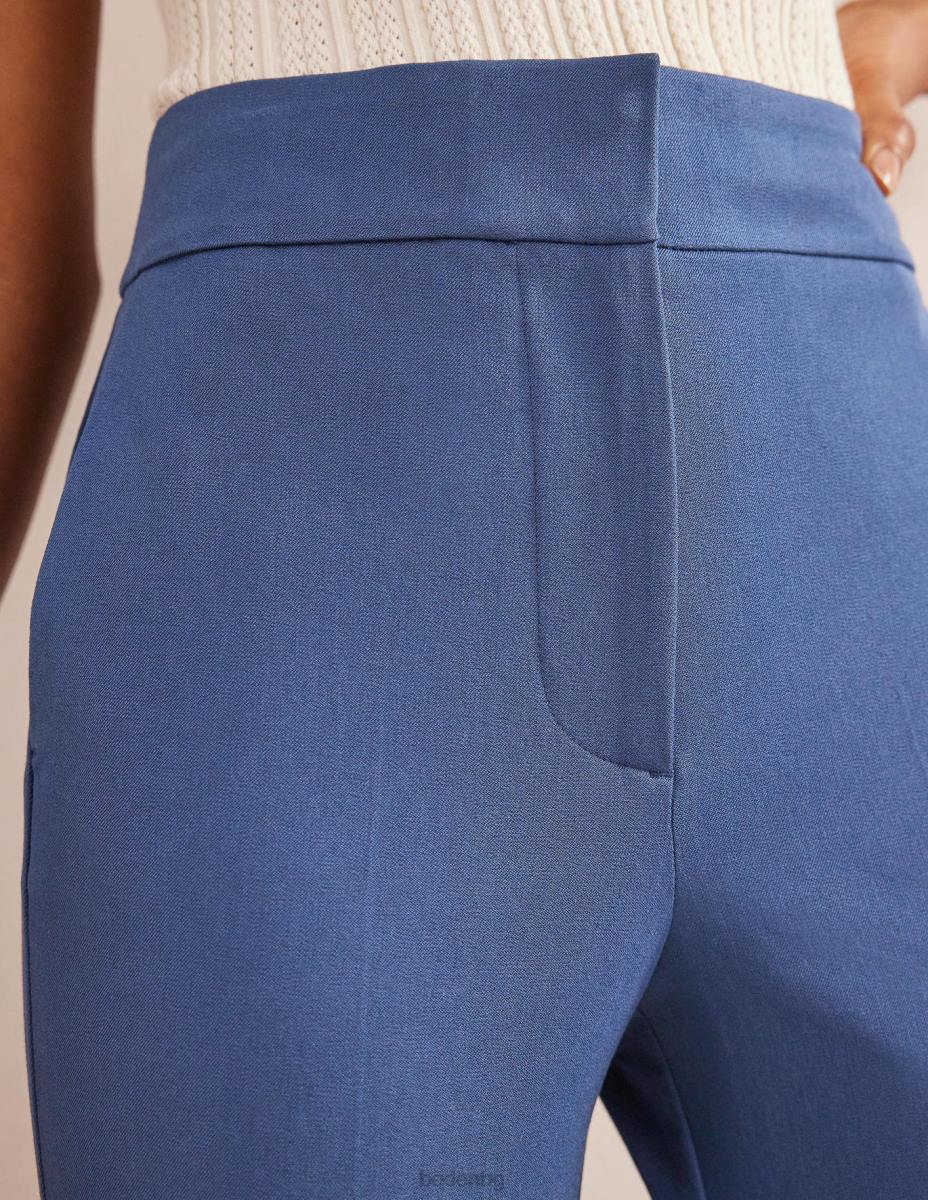 облекло Boden двуеластични панталони с кльош истинско синьо Жени LL682280