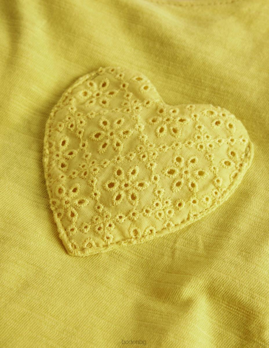 облекло Boden тениска broderie с джоб сладка царевица жълта бебе LL683461