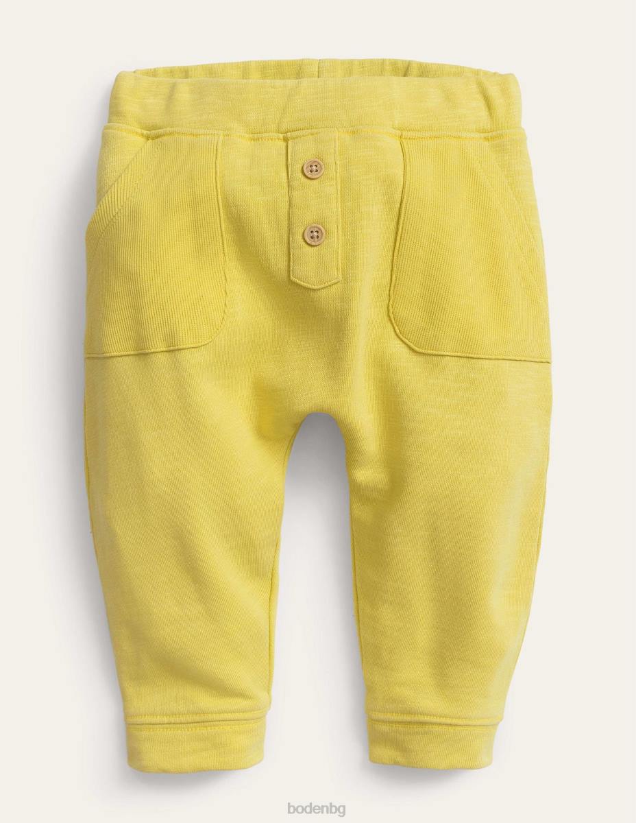 облекло Boden долнища за пране на дрехи лютиче жълто бебе LL683353