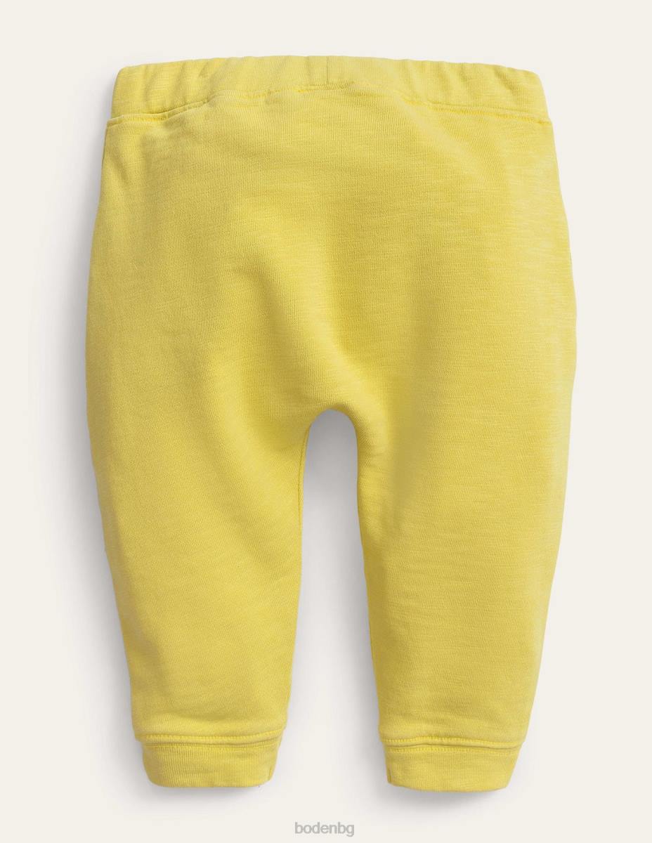 облекло Boden долнища за пране на дрехи лютиче жълто бебе LL683353