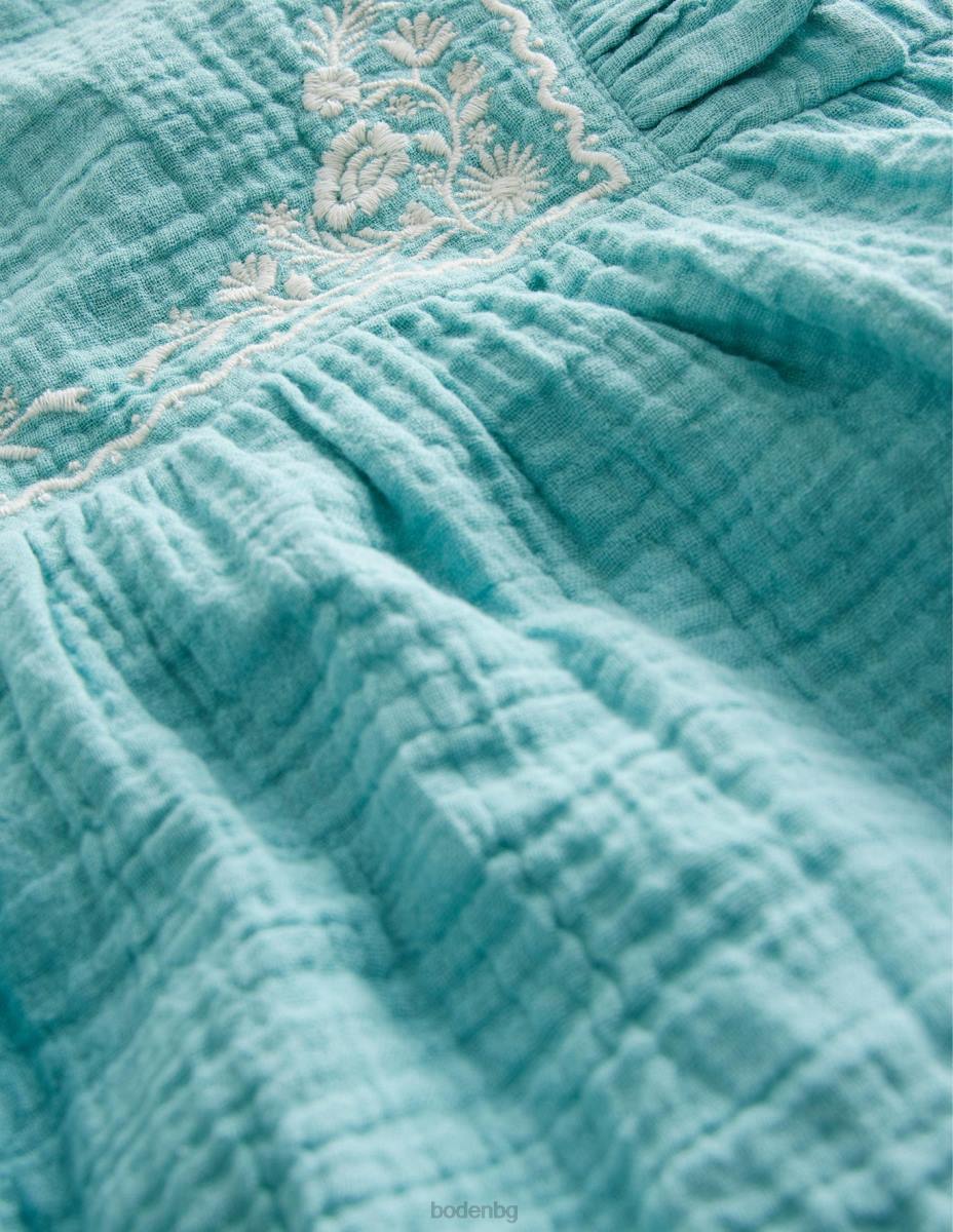 облекло Boden бродирана горна част от двоен плат аква море момичета LL682999